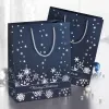 SIGEL GT110 set de bolsas de regalo copos de nieve plateados, pack de 3, papel recubierto, asas de cordón textil blanco, brillo metálico, para Navidad e invierno, 230 x 180 x 100 mm