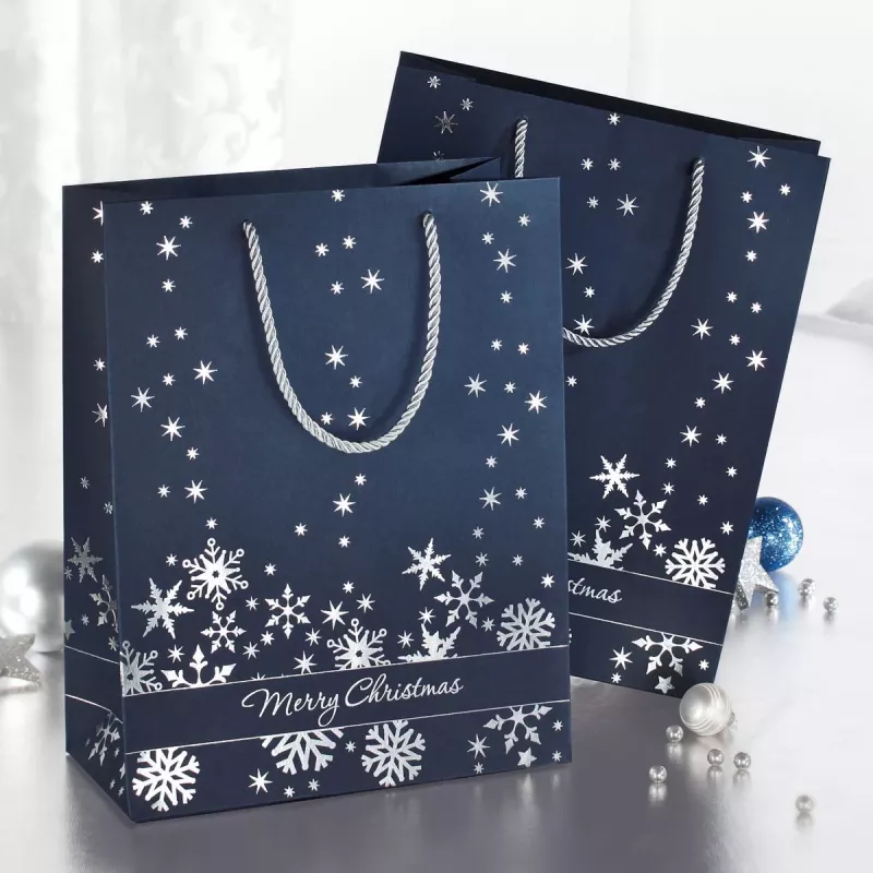 SIGEL GT110 set de bolsas de regalo copos de nieve plateados, pack de 3, papel recubierto, asas de cordón textil blanco, brillo metálico, para Navidad e invierno, 230 x 180 x 100 mm