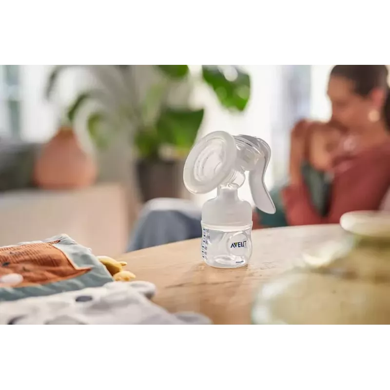 Philips Avent Sacaleches manual Lotus con 3 vasos de almacenamiento y adaptador
