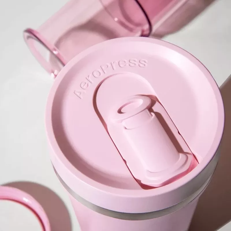 Cafetera AeroPress Go Plus con vaso térmico rosa 475 ml