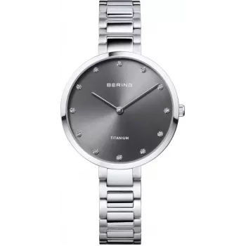 BERING Reloj de mujer Classic Collection cuarzo 34mm esfera azul con acabado sol cepillado pulsera milanesa plateada 11334-772