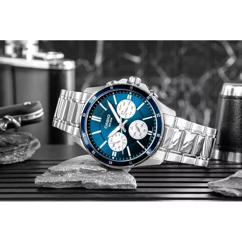 Casio MTP-1374D-2A3 reloj de hombre analógico de cuarzo con brazalete de acero inoxidable, esfera azul, indicador de día y fecha, 50m resistencia al agua