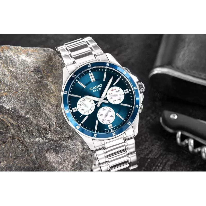 Casio MTP-1374D-2A3 reloj de hombre analógico de cuarzo con brazalete de acero inoxidable, esfera azul, indicador de día y fecha, 50m resistencia al agua