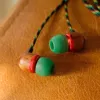 Auriculares in-ear con cable Marley Smile Jamaica con micrófono y USB-C, drivers de 9 mm – Rasta (EM-JE042-RA)