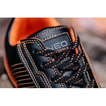 NEO Tools 82-103 Zapatos de seguridad S1P SRC con puntera de acero y protección antiperforación, parte superior de serraje y malla, suela de PU de doble densidad, transpirables, unisex, talla 42, negro con detalles naranjas