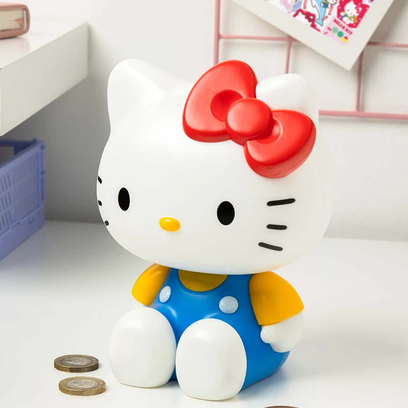 Paladone Hello Kitty Hucha en forma - Caja de monedas de cerámica, Merchandising oficial Sanrio, Blanco/Rosa/Negro, 13,5 x 13,5 x 16,5 cm