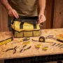 Set de herramientas Stanley FatMax de 16 piezas en bolsa amarilla con boca abierta